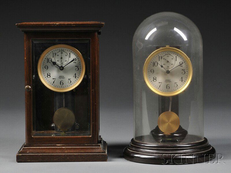 Two Poole Electric Clocks, Ithaca, New York, both: Two Poole Electric Clocks, Ithaca, New York, both 3 in. metal dials with Arabic numerals, and second's bit, marked Poole, Trade Mark, and bubble levels on base, one cased in mahogany and beveled glas