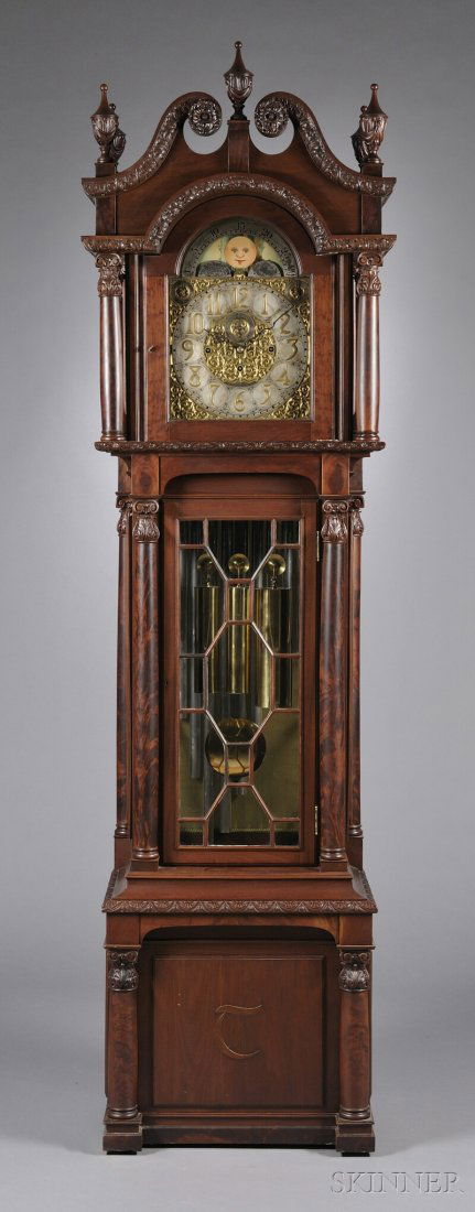 Elite Mahogany Twelve Tubular Bell Chime Clock, Ge: Elite Mahogany Twelve Tubular Bell Chime Clock, Germany, c. 1900, carved scroll-top case with free-standing columns and, flanking composite brass dial, with Arabic numerals, marked Bawo & Dotter Ltd,