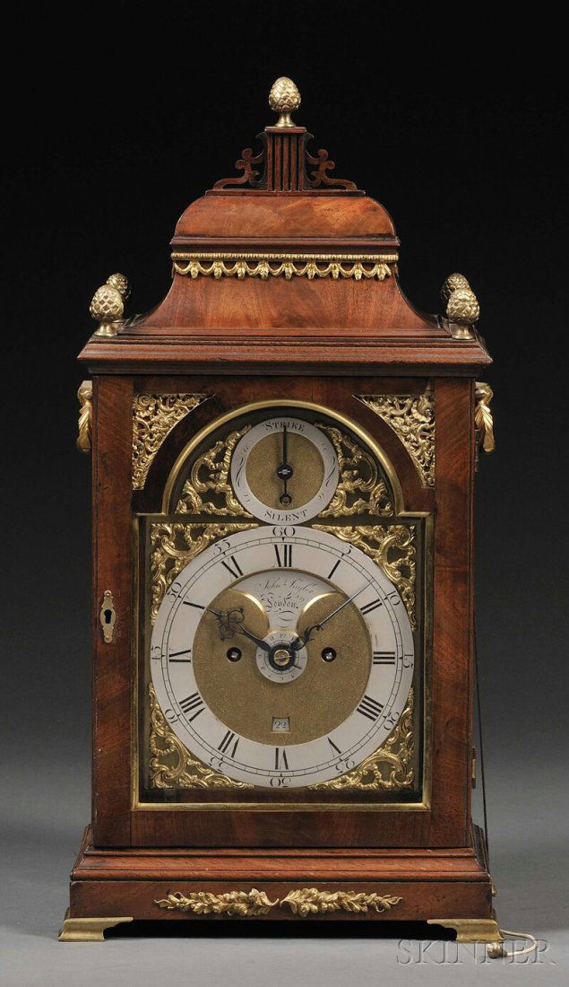 John Taylor Mahogany Table Clock, London, c. 1765,: John Taylor Mahogany Table Clock, London, c. 1765, the composite brass dial with engraved recessed maker's boss marked John Taylor, London, silvered chapter ring with Roman numerals, alarm disc at the