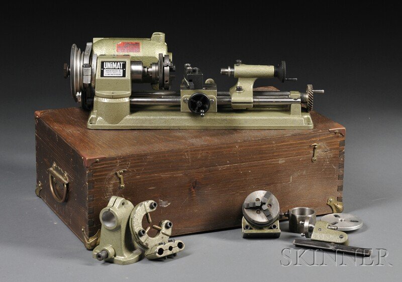 Two Unimat SL Lathes, Austria, both with 13-in. be: Two Unimat SL Lathes, Austria, both with 13-in. beds, headstocks, tailstocks, cross slides, two three-jaw chucks, 115 volt electric motors, and miscellaneous cutting tools.