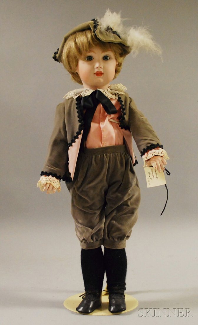 Large Reproduction Bisque Head Jumeau Doll, incised: Large Reproduction Bisque Head Jumeau Doll, incised JB 1984 "Arielle" with closed mouth, blue eyes, composition body, bisque lower arms, gray velvet outfit, ht. 28 in.