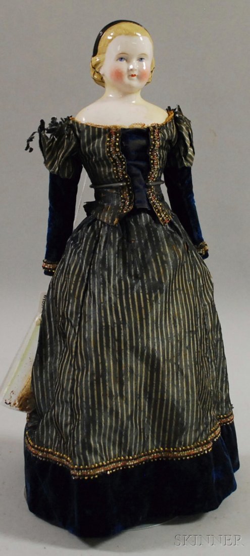 Large Blonde China Doll with Hairband and Snood, cl: Large Blonde China Doll with Hairband and Snood, cloth body, kid arms, heeled red leather shoes, ht. 20 in.