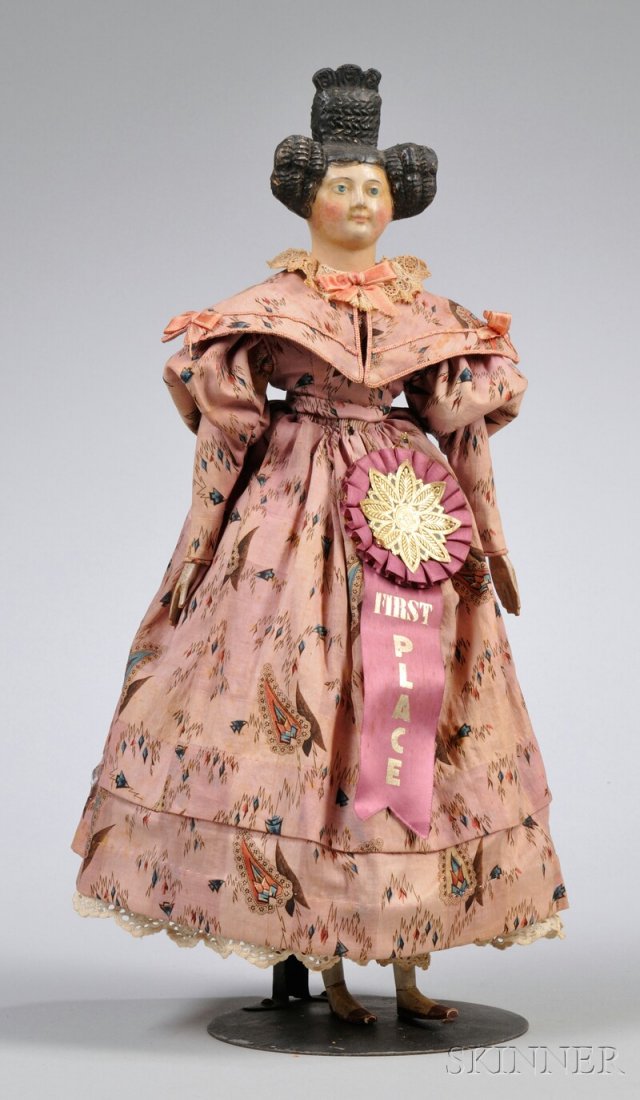 Papier-mache Milliner Model with Apollo Knot, hair : Papier-mache Milliner Model with Apollo Knot, hair kid body, wooden limbs, pink printed dress, first place ribbon from National Doll and Toy Collectors Club regional in 1972, ht. 18 in.