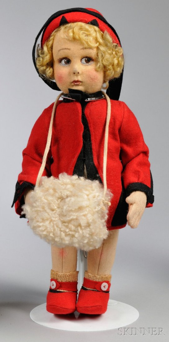 Small Felt Lenci Girl Doll, Italy, brown eyes glan: Small Felt Lenci Girl Doll, Italy, brown eyes glancing left, blonde curly mohair wig, jointed body, organdy undergarments, red felt coat-dress trimmed in black, matching hat and shoes, ht. 11 in.