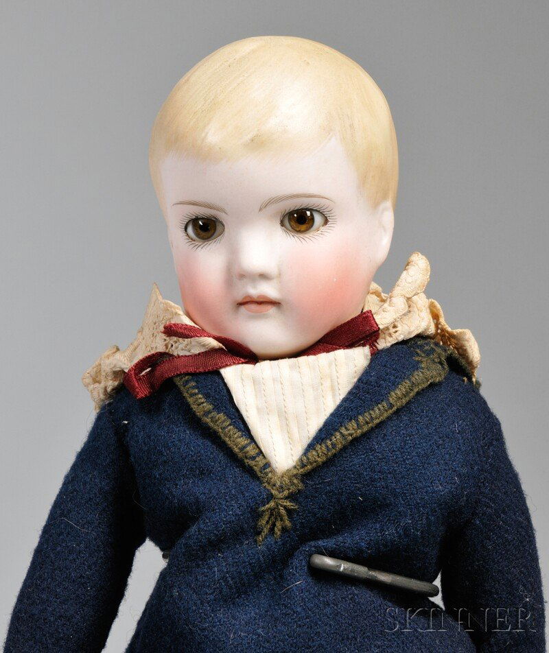 Bisque Shoulder Head Boy in Navy Suit, Germany, cl: Bisque Shoulder Head Boy in Navy Suit, Germany, closed mouth, brown stationary eyes, molded blonde hair, cloth body, kid arms, navy wool suit, green crocheted high stockings, Keystone boots marked 0,
