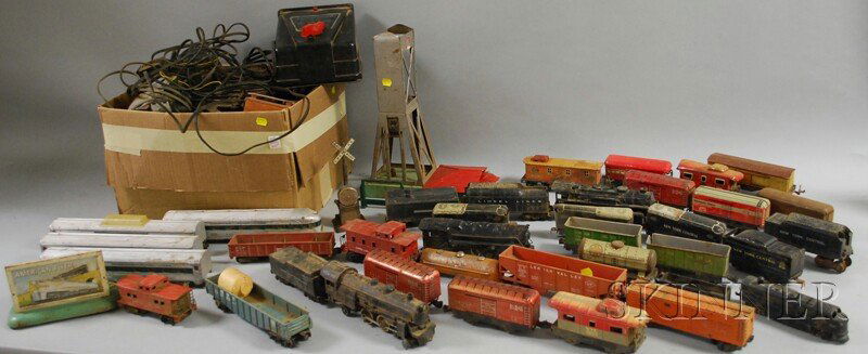 Group of Vintage Toy Electric Trains and Accessori: Group of Vintage Toy Electric Trains and Accessories, including American Flyer/A.C. Gilbert Co. transformer, switch, loader elevator, billboard, four-piece plastic passenger car set, a plastic 923 fre