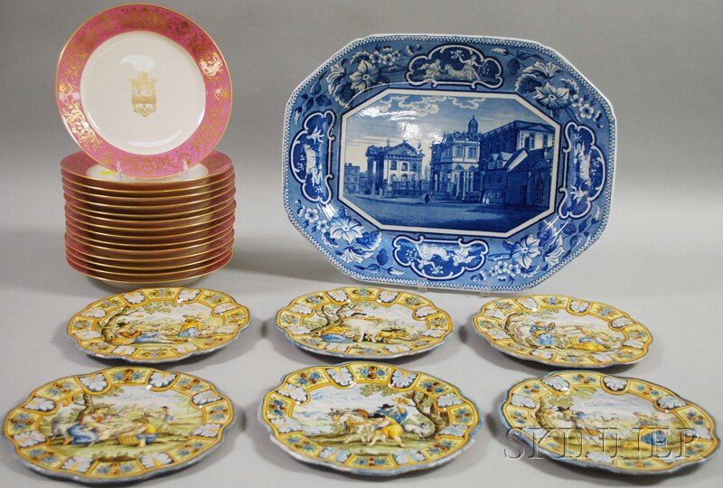 Assorted Group of Ceramic Tableware, a set of fift: Assorted Group of Ceramic Tableware, a set of fifteen gilt-decorated pink-rimmed Sevres plates with heraldry motif to the center field, six Italian faience dessert plates depicting a variety of pastor