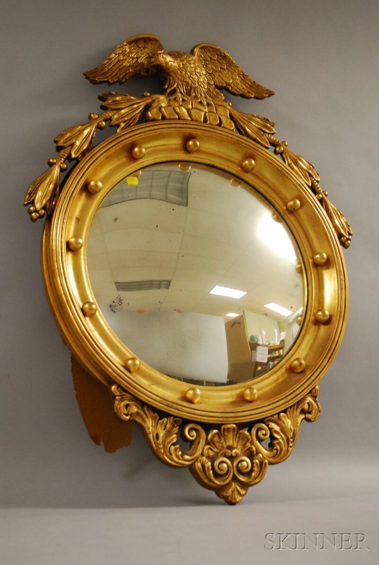 Federal-style Gold-painted Wooden Girandole Mirro: Federal-style Gold-painted Wooden Girandole Mirror with Convex Glass, (scattered glass silvering lift, gesso loss at eagle, wear), lg. 35 1/2 in.