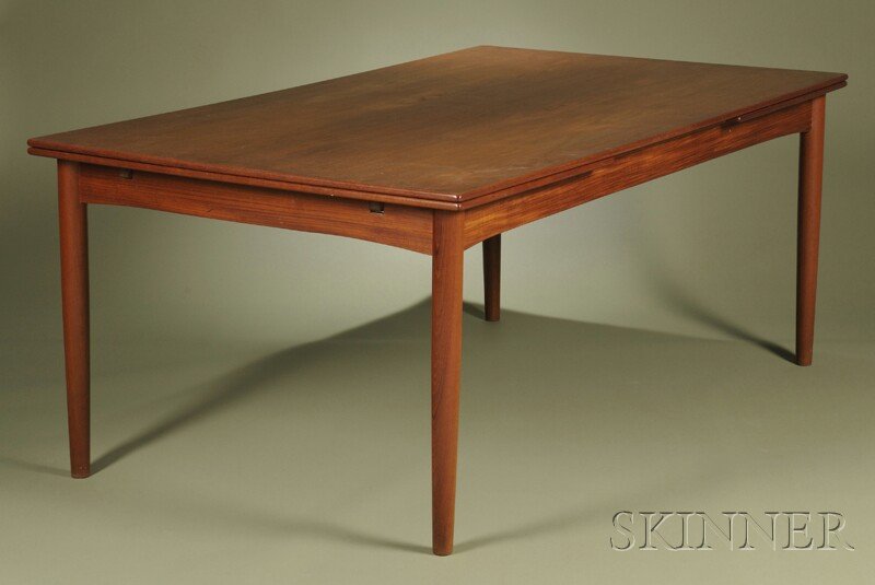 , Dining Table, Possibly Kurt Ostervig, Teak, Rect: Dining Table, Possibly Kurt Ostervig Teak Retailed by Design Research, Cambridge, Massachusetts, Denmark, c. 1965 Rectangular top with pull-out extension leaves at each end, which store under the top,