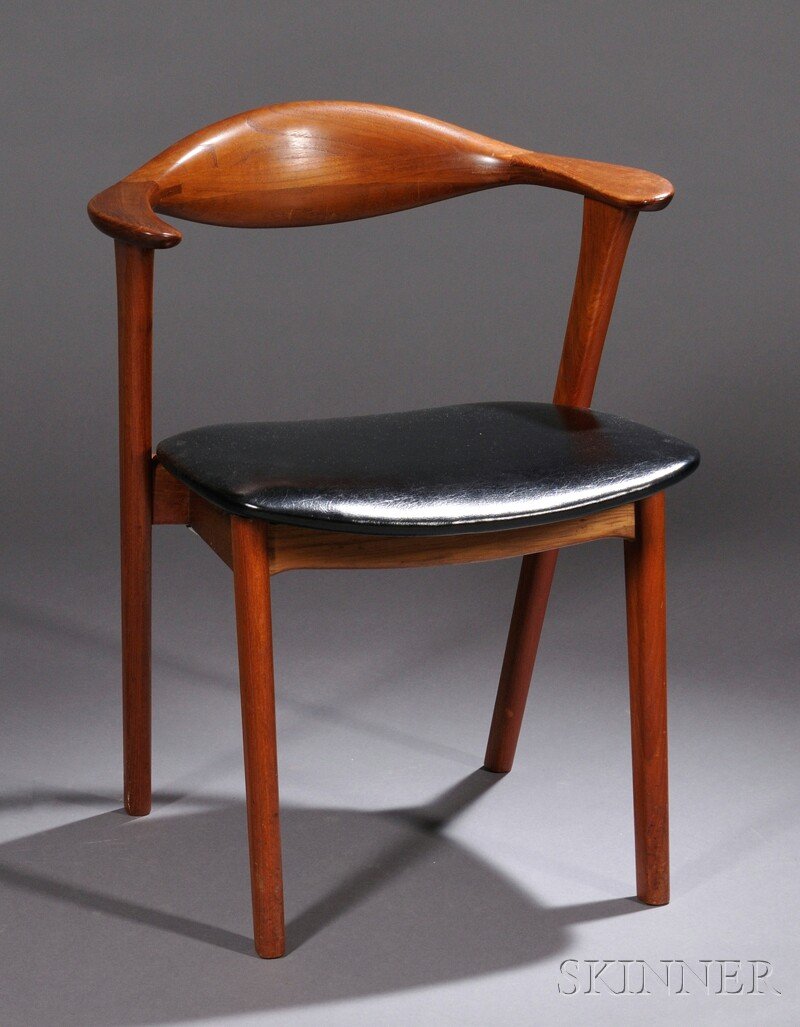 , Danish Armchair, Black leather and teak, Short a: Danish Armchair Black leather and teak Short arm with curved back rail in the manner of Hans Wegner, canted rear legs, black leather seat, needs tightening, ht. 28 1/2, wd. 23 1/8 in.