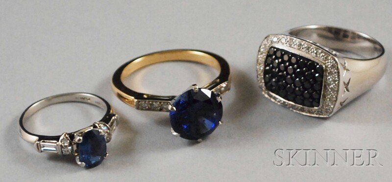 Three Diamond and Gemstone Rings, a platinum, diam: Three Diamond and Gemstone Rings, a platinum, diamond, and blue stone ring, a 14kt white gold, white diamond, and black diamond ring, and a 14kt yellow gold, blue stone, and diamond ring, total 12.4 d