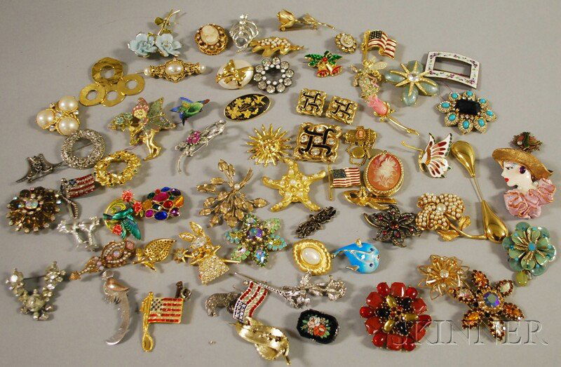 Large Group of Costume Brooches, some signed, make: Large Group of Costume Brooches, some signed, makers include Coro, Swarovski, Trifari, Monet, Florenza, Kirk & Folly, and Marvella.