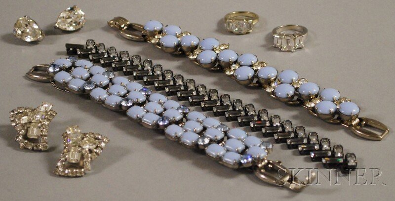 Small Group of Mostly Paste and Rhinestone Costume: Small Group of Mostly Paste and Rhinestone Costume Jewelry, a 14kt white gold and rhinestone ring, a second rhinestone ring, two pairs of earclips, and three bracelets.
