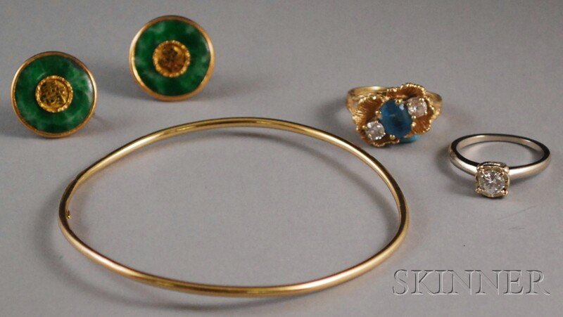 Four Jewelry Items, a 14kt white gold diamond soli: Four Jewelry Items, a 14kt white gold diamond solitaire, approx. 0.44 cts., buttercup mount, size 7, a gold gem-set ring, and a pair of 14kt gold and jade earrings, total 10.6 dwt.