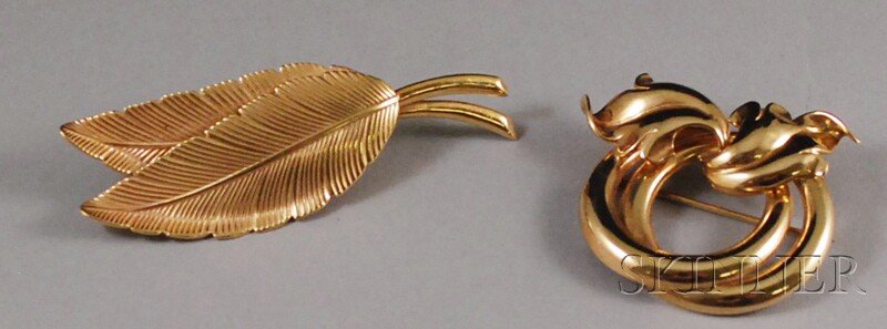 Two 14kt Gold Brooches, a pair of leaves and a dou: Two 14kt Gold Brooches, a pair of leaves and a double-ring brooch with leaf accents, total 14.6 dwt, leaf brooch wd. 2 1/2, rings wd. 1 1/2 in.