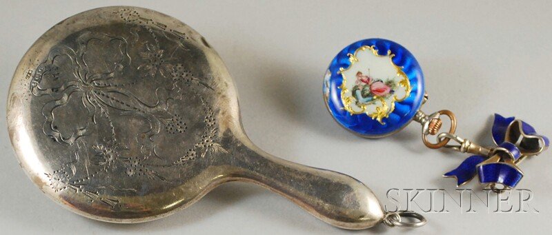Two Lady's Items, a small English silver-mounted c: Two Lady's Items, a small English silver-mounted chatelaine mirror, and a royal blue guilloche enamel lapel watch, (some enamel loss).