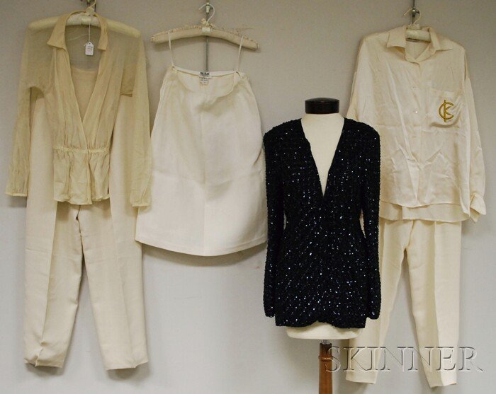 Group of Designer Clothing, two pairs of Calvin Kl: Group of Designer Clothing, two pairs of Calvin Klein cream silk trousers, a Calvin Klein cream silk blouse with logo embroidered in gold on the front pocket, a sheer ivory Halston blouse, a Bill Blas