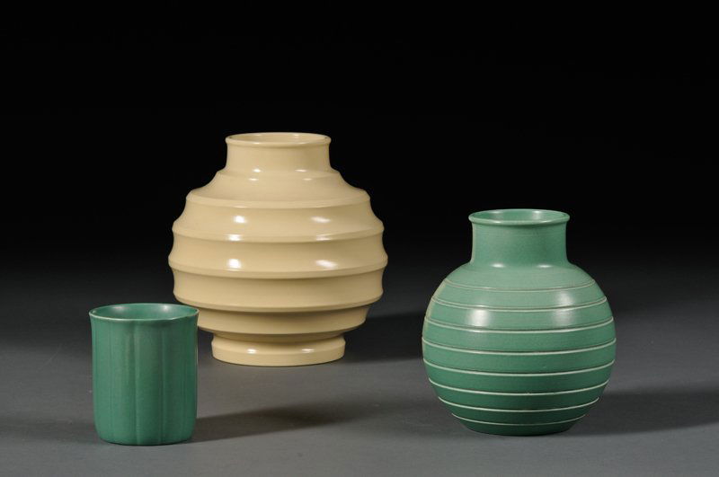 Three Wedgwood Keith Murray Design Vases, England,: Three Wedgwood Keith Murray Design Vases, England, c. 1940, a green-glazed globular shape with incised concentric rings, ht. 6; a straw-glazed globular vase with concentric rings, ht. 7 1/8; and a mat