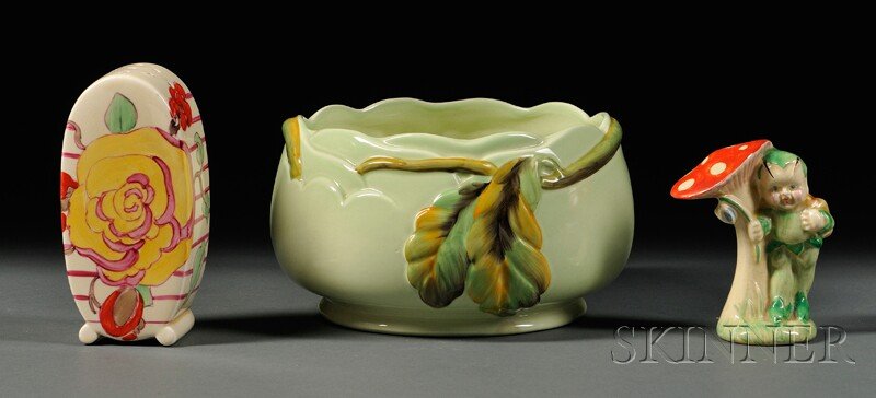 Three Clarice Cliff Items, England, 20th century,: Three Clarice Cliff Items, England, 20th century, Newport and Wilkinson potteries, a bowl with green ground decorated with molded leafy tendrils, shape "833," and pale green backstamp, dia. 6 1/4; fig