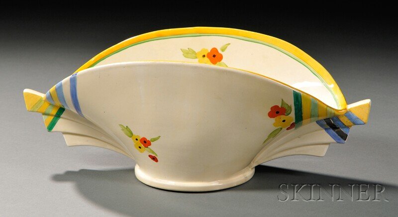 Clarice Cliff Bizarre Ware Bowl, England, 20th cen: Clarice Cliff Bizarre Ware Bowl, England, 20th century, Newport and Wilkinson potteries, the ovoid form flanked by stepped handles, and decorated with polychrome banding and flower sprays, shape "450,