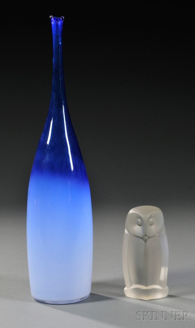 Two Pieces of Leerdam Glass, Holland, 20th century: Two Pieces of Leerdam Glass, Holland, 20th century, a Floris Meydam-designed Unica bottle-form blue ombre vase with narrow neck, etched "Leerdam 19 M," ht. 17 3/4; and a colorless frosted crystal owl,