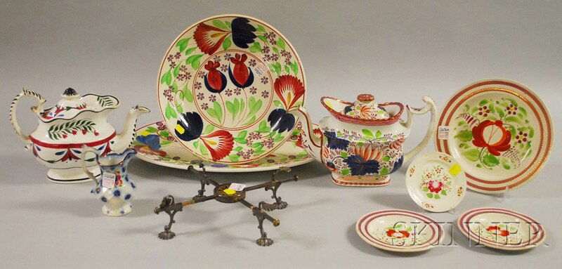 Ten Pieces of English Hand-painted and Copper Lus: Ten Pieces of English Hand-painted and Copper Lustre-decorated Ceramic Tableware and a Silver Plated Table Cross, including a platter, serving bowl, three teapots, four plates, and a jug.