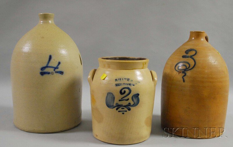 Three Pieces of Stoneware, with some cobalt decor: Three Pieces of Stoneware, with some cobalt decoration or highlighting, a large jug, large "3"-gallon jug (cracked), and an "S. Hart, Fulton" "2"-gallon crock.