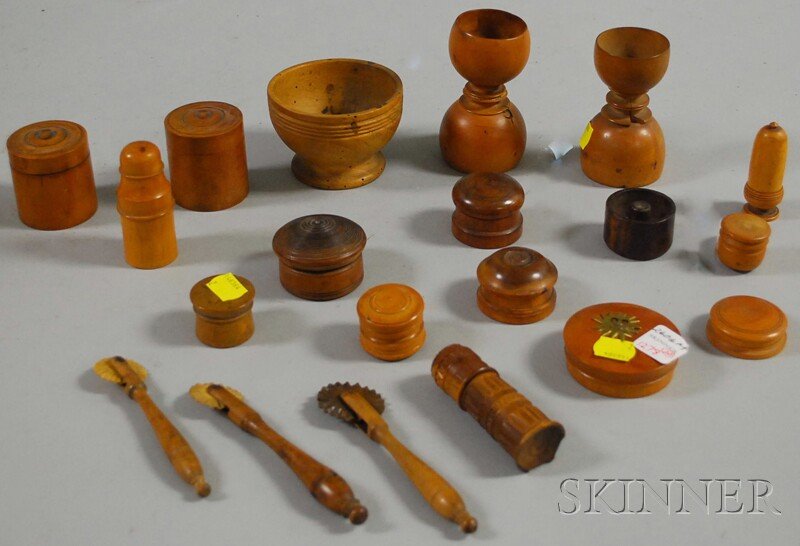 Seventeen Small Turned Wood Items and Three Jaggi: Seventeen Small Turned Wood Items and Three Jagging Wheels, including boxes and cases, a footed bowl, and two egg cups.