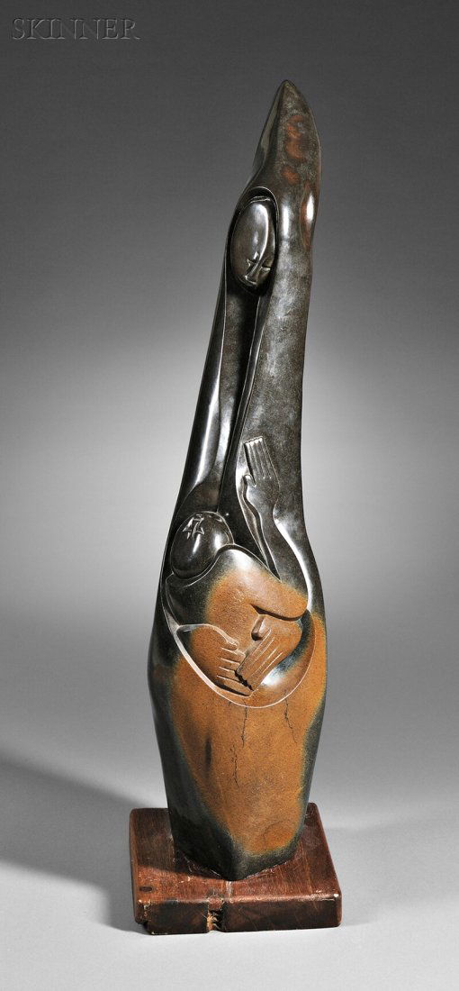 Nicholas Mukomberanwa (Zimbabwean, 1940-2002) Mother an: Nicholas Mukomberanwa (Zimbabwean, 1940-2002) Mother and Child Incised "N.V.M." in the stone at the back lower edge. Carved and polished stone, 44 1/2 x 12 x 8 in. (11.8 x 30.5 x 20.3 cm), on a carved