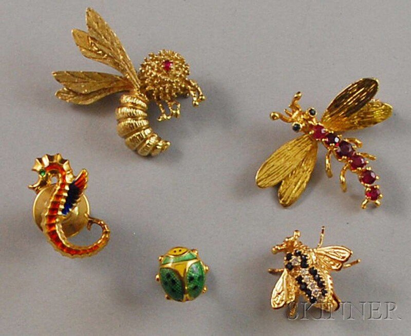 Five Gold Insect and Animal Brooches, an 18kt gold: Five Gold Insect and Animal Brooches, an 18kt gold gem-set dragonfly, a 14kt gold wasp with red gemstone eye, a small 18kt gold and enamel ladybug pin, a 14kt gold gem-set fly, and an 18kt gold and en