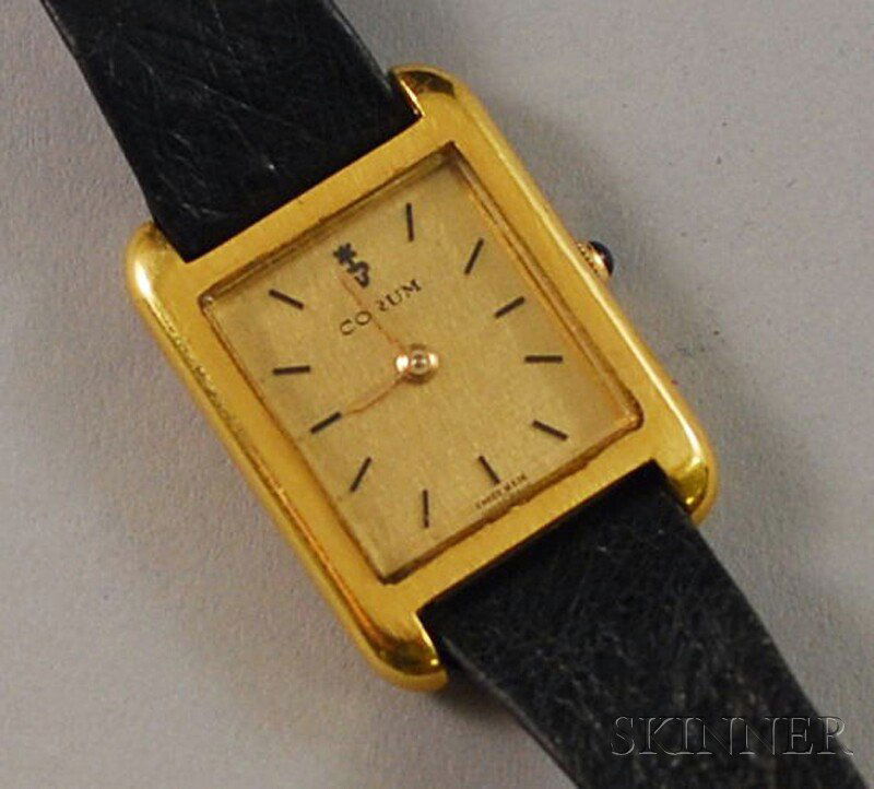 18kt Gold Corum Wristwatch, with gold-tone dial an: 18kt Gold Corum Wristwatch, with gold-tone dial and baton numeral indicators, 17-jewel movement no. 69999, case no. 847122, total 11.4 dwt not including movement but including original adjustable leat