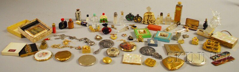 Group of Assorted Perfumes, Compacts, and Dresser: Group of Assorted Perfumes, Compacts, and Dresser Items, including combs, mirrors, and makeup containers, perfumes with various ornamentation, some with sterling silver overlay and/or tops, compacts b
