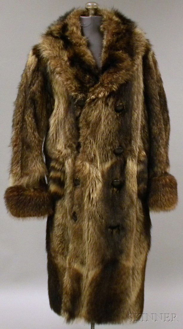 Men's Marshall Field & Co. Heavy Fur Coat, possibl: Men's Marshall Field & Co. Heavy Fur Coat, possibly raccoon, with large cuffs and collar, leather buttons, two outer pockets and one inside, lined with brown satin.