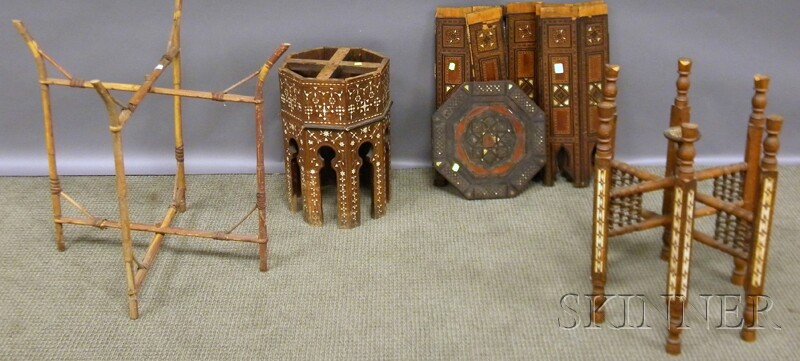 Two Brass and Damascene-decorated Tray Tables, Tw: Two Brass and Damascene-decorated Tray Tables, Two Inlaid Tabourets, and a Persian Tile-top Painted Iron Stand.
