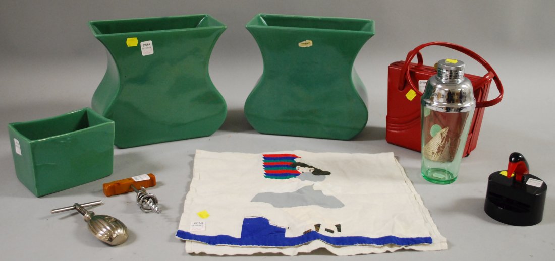 Ten Assorted Mid-century and Decorative Items, th: Ten Assorted Mid-century and Decorative Items, three green-glazed Haeger pottery planters, an appliqued linen dish towel with maid design, a red vinyl snap-close purse, a cocktail shaker with chrome c