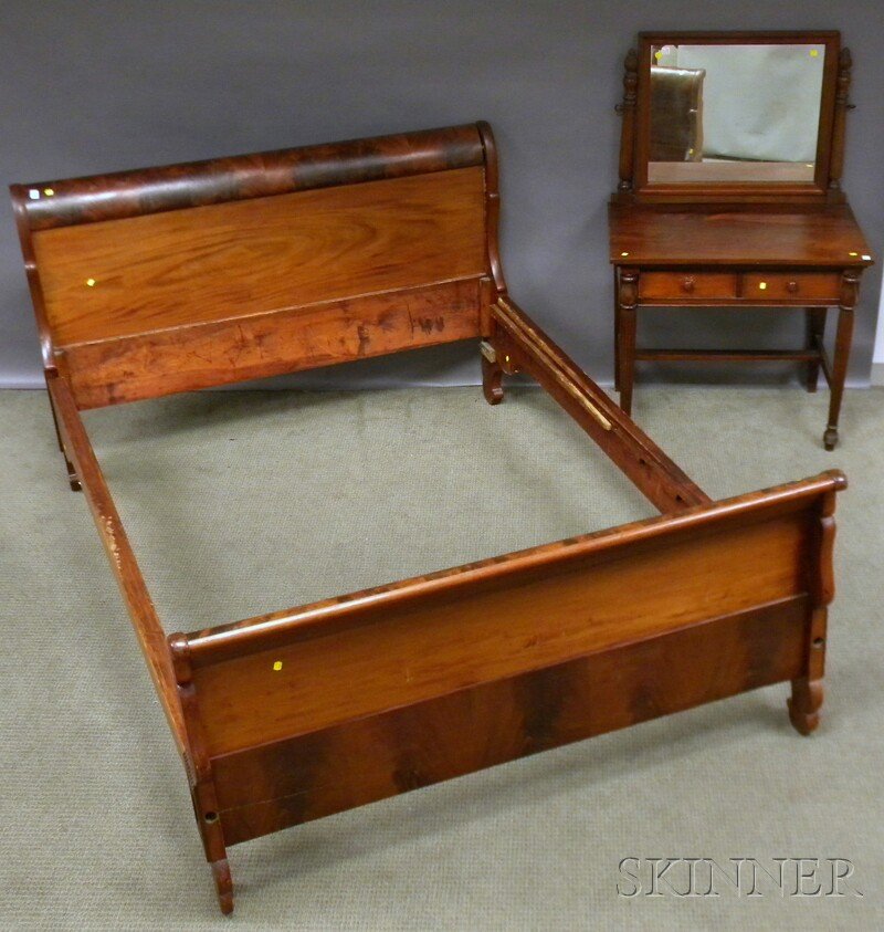 Empire Mahogany Veneer Sleigh Bed and a Classical: Empire Mahogany Veneer Sleigh Bed and a Classical-style Mahogany Dressing Table with Mirror, including rails.