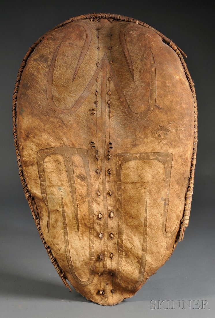 Wood and Hide Masai Shield, Kenya, early 20th centu: Wood and Hide Masai Shield, Kenya, early 20th century, ht. 35 in.