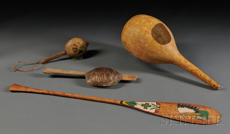 Four Northeast Items, 20th century, a gourd dipper: Four Northeast Items, 20th century, a gourd dipper, a painted tourist paddle, a rattle, and a clapper (?) made from wood and turtle shell, paddle lg. 28 in. Provenance: Dr. Frank T. Siebert Collection