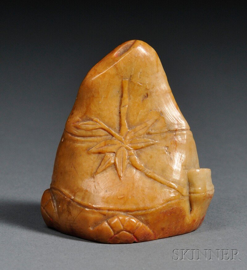 Soapstone Seal, China, 19th/20th century, depictin: Soapstone Seal, China, 19th/20th century, depicting bamboo, stone of yellow color with some red markings, carved with seal script characters at the base, lg. 2 in.