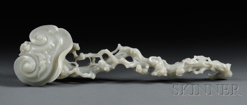 Jade Scepter, China, 19th century, depicting a lin: Jade Scepter, China, 19th century, depicting a lingzhi branch, surmounted with two small bats and a dragon at the edge of terminal, twisting branch form with small lingzhi groups, stone of pale celado