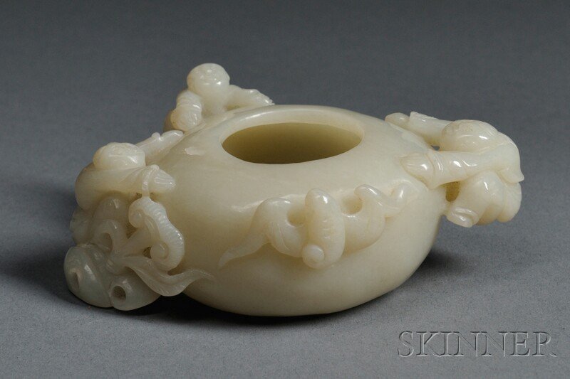 Jade Water Coupe, China, 19th/20th century, carve: Jade Water Coupe, China, 19th/20th century, carved with three children and a bat climbing the exterior, with inclusions, lg. 3 1/2 in.