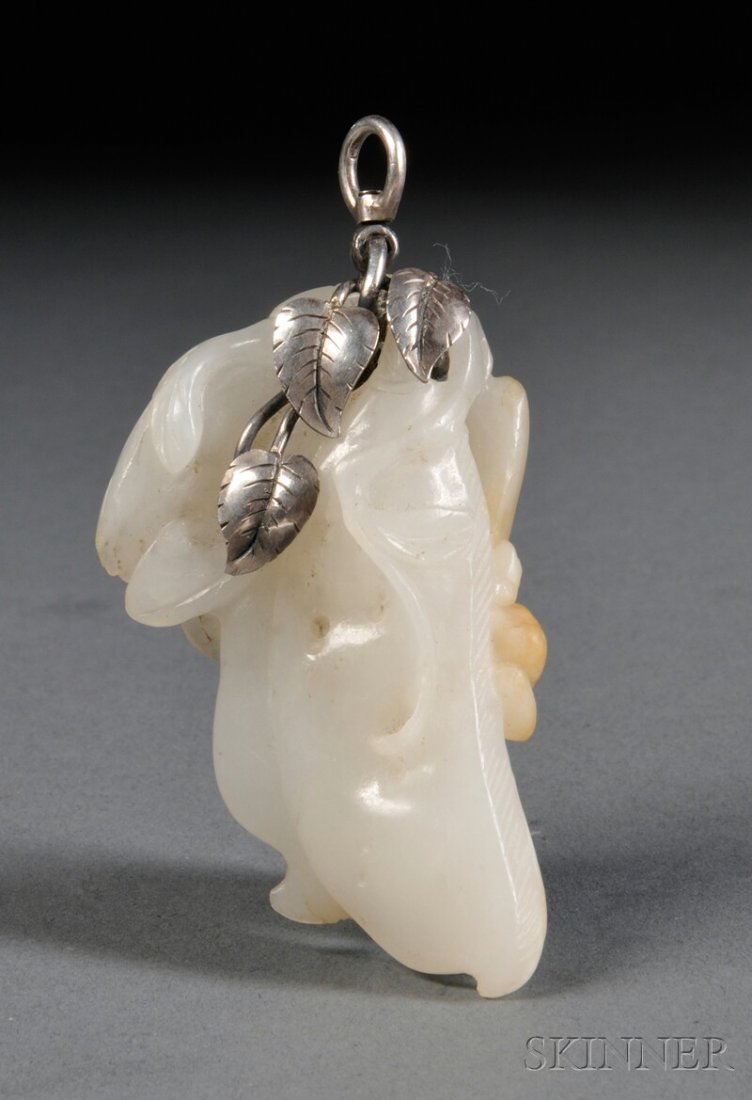 Jade Pendant, China, 20th century, carving of a dr: Jade Pendant, China, 20th century, carving of a dragonfly landing on a bean, with silver mount formed as leaves, white stone with minor russet inclusions, lg. 2 3/4 in.