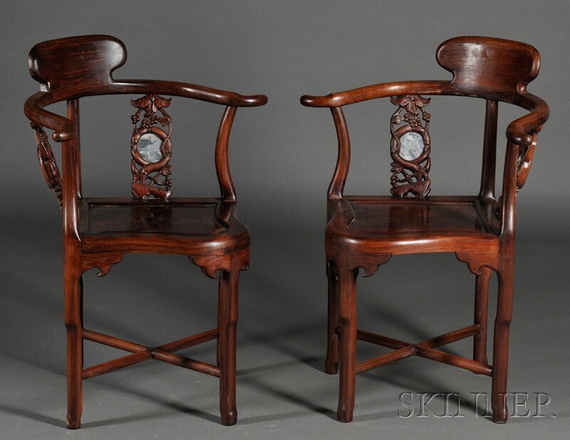 Pair of Corner Chairs, China, 20th century, back s: Pair of Corner Chairs, China, 20th century, back splats each inset with a gray variegated marble panel and carved with berries and bats, ht. 33 1/8 in.