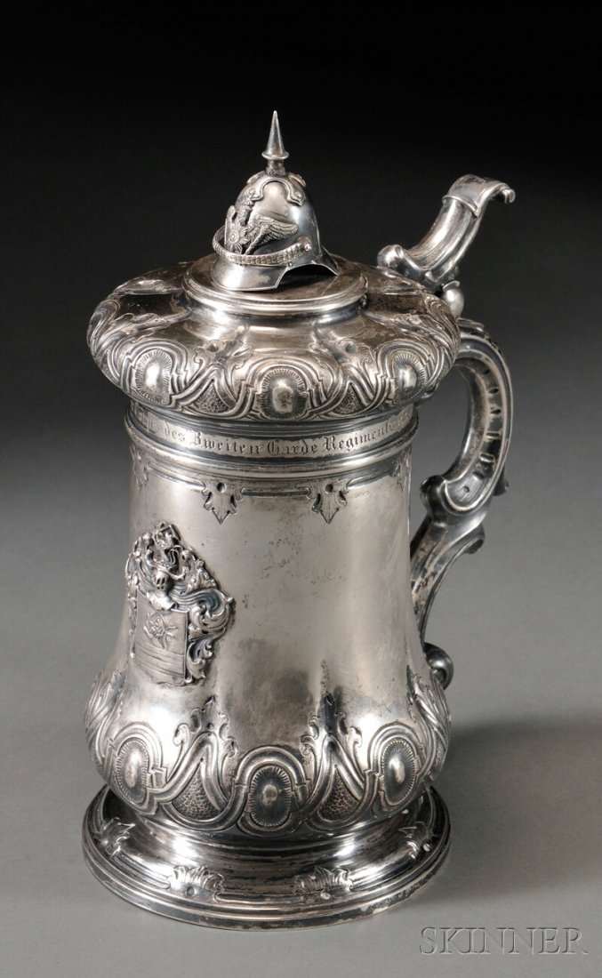 German Commemorative Tankard, Berlin, mid-late 19t: German Commemorative Tankard, Berlin, mid-late 19th century, with a 12 loth standard mark, "Wilm.Berlin" and assayer marks "L" and "D;" decorated with helmet finial, rocaille C-scroll handle, register