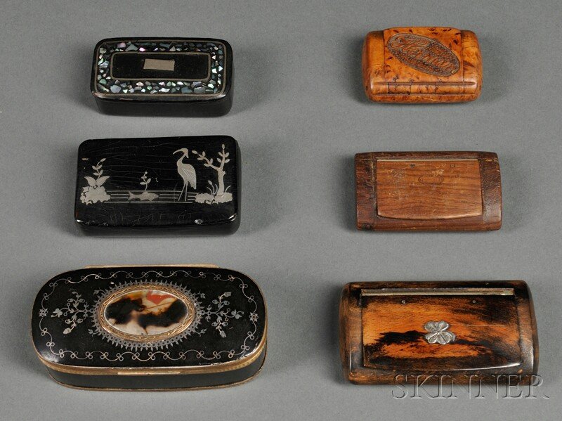 Six Assorted Snuff Boxes, 19th century, three lacq: Six Assorted Snuff Boxes, 19th century, three lacquer: one inlaid with tortoiseshell and mounted with silver and gold, lg. 3 3/4, one silver-inlaid and depicting a marsh scene with a crane and fish, l
