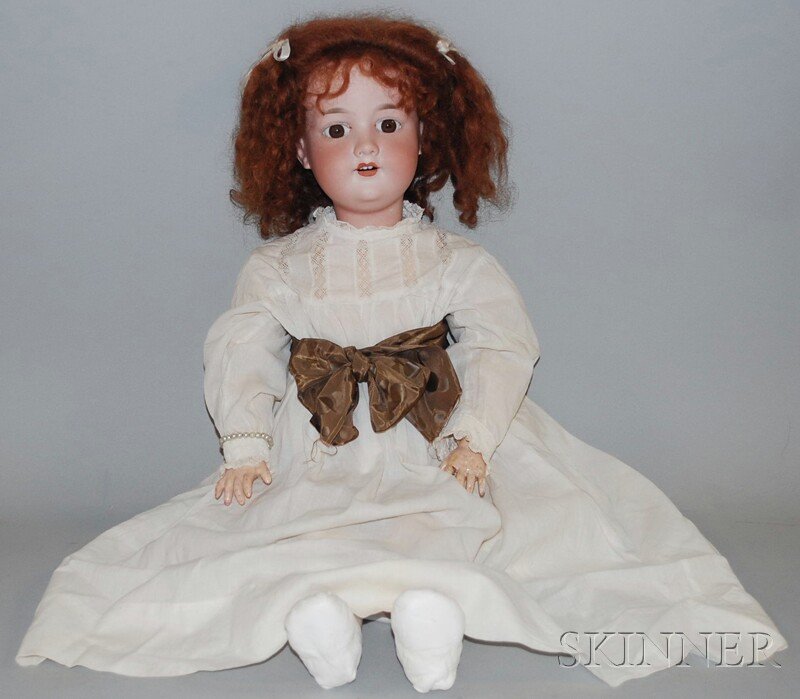 Large AM 390 Bisque Head Doll, Germany, brown eyes: Large AM 390 Bisque Head Doll, Germany, brown eyes set stationary, auburn mohair wig, jointed body, old white cotton dress, ht. 25 in.