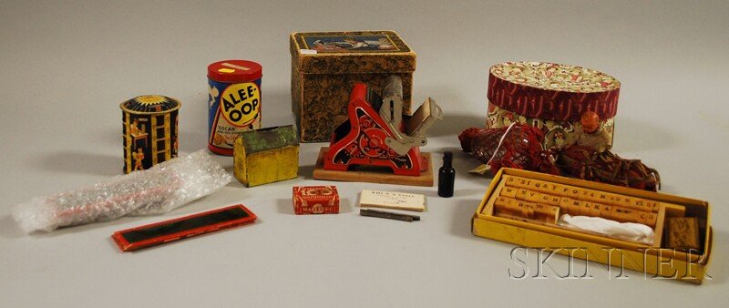Assorted Toy Group, early 20th century, boxed Germa: Assorted Toy Group, early 20th century, boxed German printing press; boxed Fulton Great American Printer; early light bulb converted into a balloon with celluloid child suspended in a canoe-shaped gon
