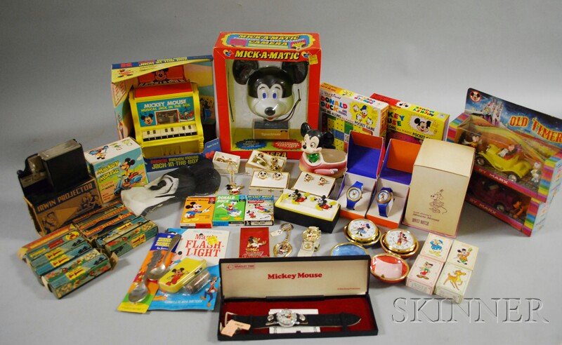 Group of Vintage and Collectible Mostly Disney Ite: Group of Vintage and Collectible Mostly Disney Items, seven Disney Jecktor movies, a boxed Irwin projector and four non-Disney Jecktor movies, two Marx Old Timer cars in boxes, a Marx friction Mickey