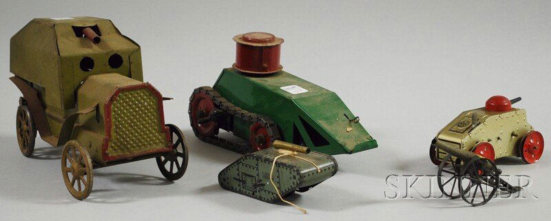 Four Army Toys and a Cast Metal Cannon, a Marx tan: Four Army Toys and a Cast Metal Cannon, a Marx tank, artillery truck, Structo Toy tank in box, "Treat 'em Rough" tank.