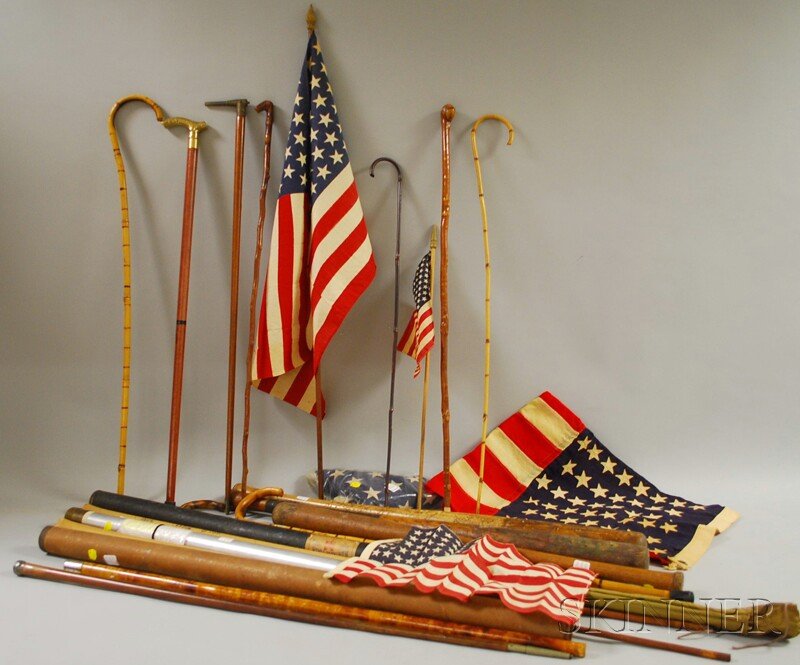 Group of Canes, Baseball Bats, Fly Rods, and Vinta: Group of Canes, Baseball Bats, Fly Rods, and Vintage U.S. Flags, including four small printed U.S. hand flags, two c. 1900 U.S. flags, three fly-fishing rods, marked "Montague," "Marvel/Hardy Bros.,"